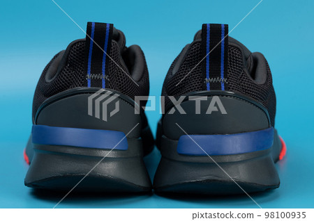 Rear view of black trainers shoes Rear view of black trainers shoes 98100935