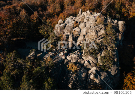 View of the Dovbush rocks from the mountain, a beautiful autumn landscape and a view of the Ukrainian nature reserve of the Dovbush rocks. 98101105