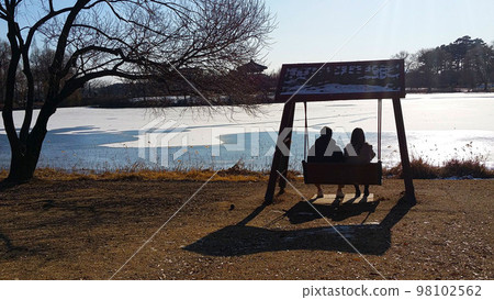 People dazed while looking at the various shapes blooming on the snow-covered lake People dazed while looking at the various shapes blooming on the snow-covered lake 98102562