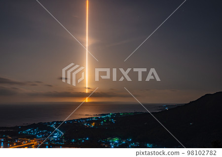 Night view of Yakushima (February) Light trails of rockets launched from Tanegashima 98102782