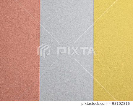 Wall with three colors, decorative plaster  pink yellow white tone colors of cement wall background texture divided into three parts. Surface of concrete texture  background colors. 98102816