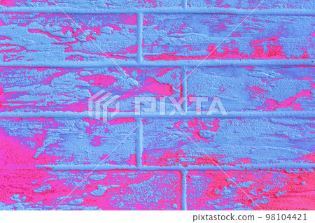 Pink or purple and light blue abstract paint pattern surface brick wall texture background 98104421