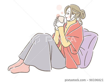 A woman drinking a hot drink 98106821