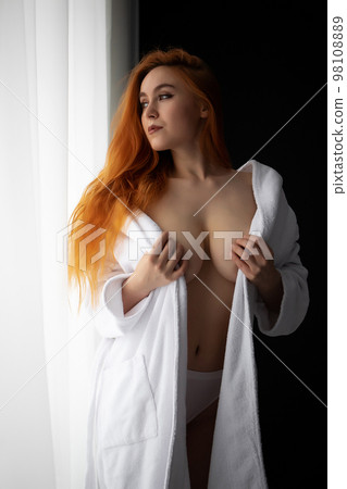 Topless sensual woman at home Topless sensual woman at home 98108889