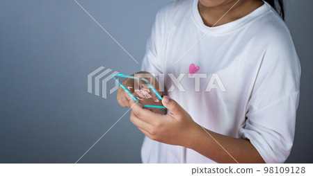 People's fingers are pressing on the phone screen fingerprint scanner. Represents protection against external hacks, code protection security concepts, viruses, firmware and malware. 98109128