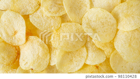 crispy potato chips snack texture background top view 98110428