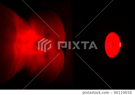Woman with infrared Treatment Woman with infrared Treatment 98110658