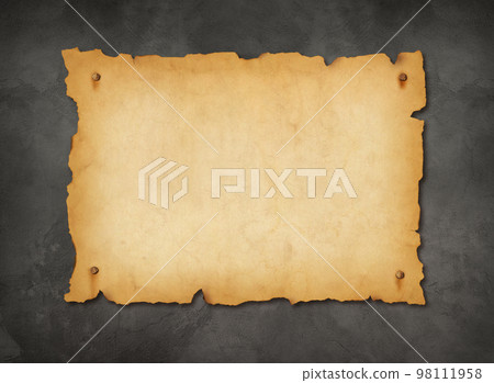 Old mediaeval paper sheet. Horizontal parchment scroll on a concrete wall 98111958