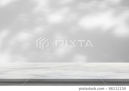 Marble table with tree shadow drop on white wall background for mockup product display 98112130