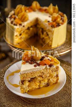 Portion of creamy orange cake Portion of creamy orange cake 98113045