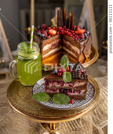 Tasty layered chocolate cake Tasty layered chocolate cake 98113111