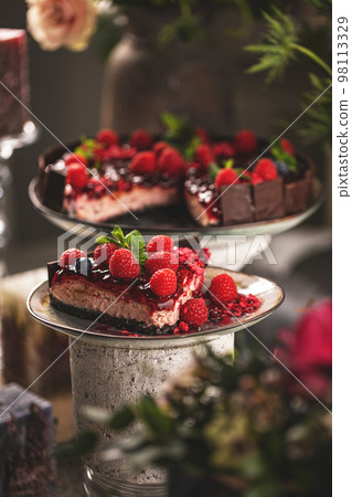 Cheeseckae with raspberry jelly topping Cheeseckae with raspberry jelly topping 98113329