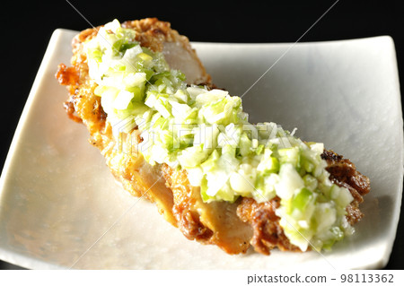Shoot green onion salt chicken on a black background Shoot green onion salt chicken on a black background 98113362