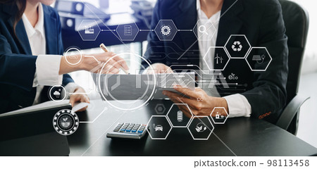 Business asian team working virtual modern smartphone to reduce CO2 emissions carbon footprint climate change to limit global warming.Sustainable development and green business concept 98113458