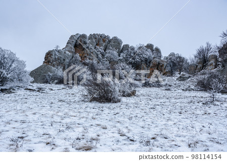 Mount Alenga near Southern Demerdzhi in snow and ice in spring. Crimea Mount Alenga near Southern Demerdzhi in snow and ice in spring. Crimea 98114154