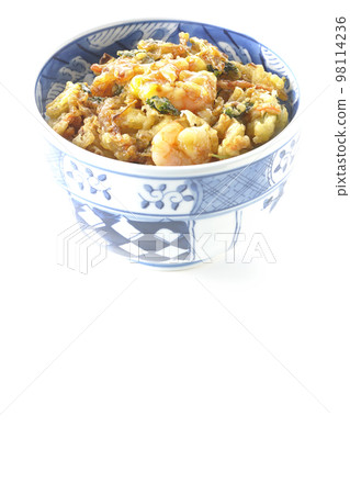 Kakiage rice bowl with vegetables and shrimp shot against a white background 98114236