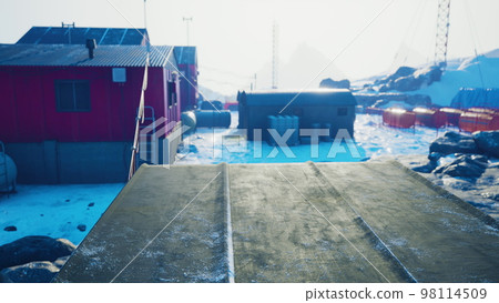 Polar weather station on the shore of the sea 98114509