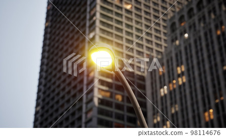 New York City street at sunset time New York City street at sunset time 98114676