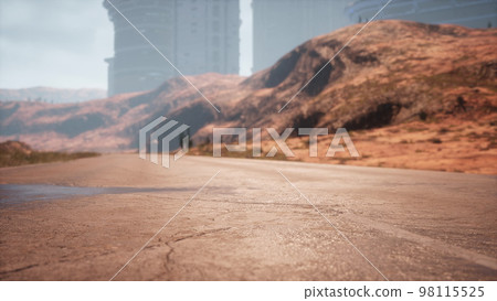 Empty desert road in the middle sand dunes 98115525