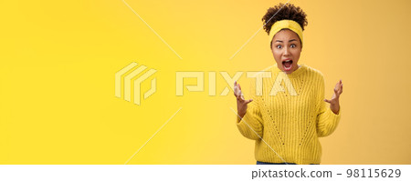 Shocked stunned african-american disappointed woman cannot believe friend messed up project look frustrated annoyed upset complaining arguing raise hands dismay questioned stare camera 98115629