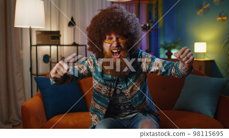 Excited happy man surprised, shocked by sudden victory, good win news, celebrating, wow reaction Excited happy man surprised, shocked by sudden victory, good win news, celebrating, wow reaction 98115695