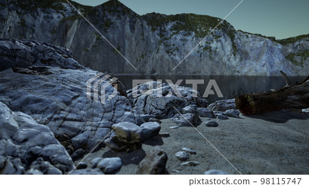 Black sand beach hidden between blurred volcanic rocks Black sand beach hidden between blurred volcanic rocks 98115747