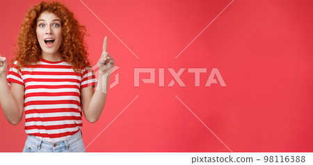 Omg fascinating store check it out. Impressed excited good-looking redhead curly emotive girl drop jaw astonished happy pointing up index fingers directed upwards telling cool news Omg fascinating store check it out. Impressed excited good-looking redhead curly emotive girl drop jaw astonished happy pointing up index fingers directed upwards telling cool news 98116388