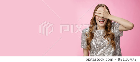 Woman eager see what inside gift box waiting when open eyes. Portrait excited attractive birthday girl hold hand face smiling anticipating surprise, attend party amused playing hide-n-seek carefree Woman eager see what inside gift box waiting when open eyes. Portrait excited attractive birthday girl hold hand face smiling anticipating surprise, attend party amused playing hide-n-seek carefree 98116472