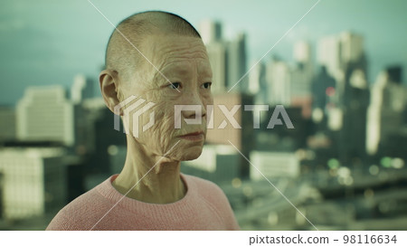 Asian old woman in the city Asian old woman in the city 98116634