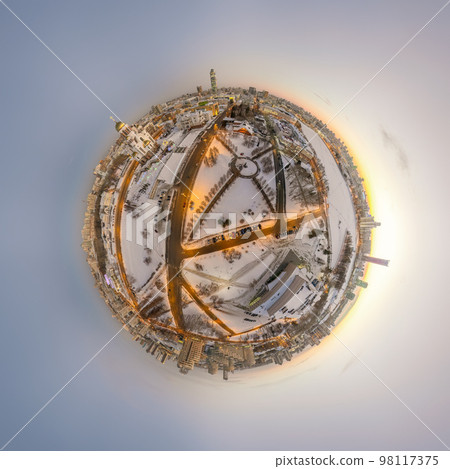Aerial winter city view with crossroads and roads, houses, buildings, parks and bridges. Copter shot. Little planet sphere mode. 98117375