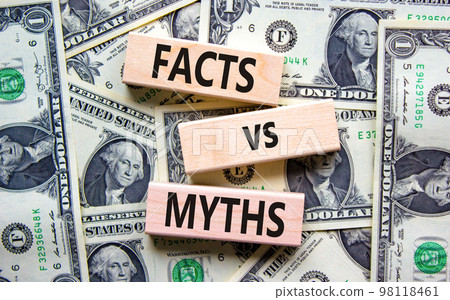 Facts vs myths symbol. Concept words Facts vs myths on wooden blocks on a beautiful background from dollar bills. Business, finacial and facts vs myths concept. Copy space. Facts vs myths symbol. Concept words Facts vs myths on wooden blocks on a beautiful background from dollar bills. Business, finacial and facts vs myths concept. Copy space. 98118461