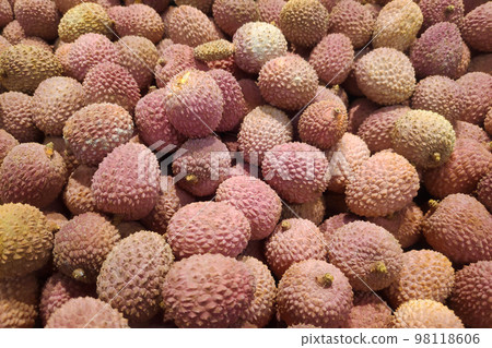 Stack of Lychees on a market stall 98118606