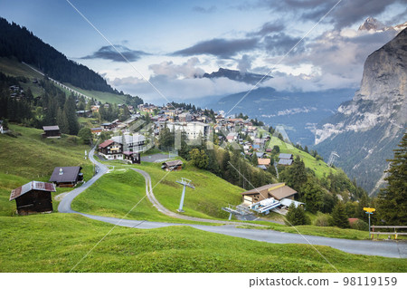 Snowcapped Bernese Swiss alps and Murren village, Switzerland Snowcapped Bernese Swiss alps and Murren village, Switzerland 98119159