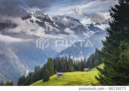 Snowcapped Bernese Swiss alps, Breithorn and alpine farms, Switzerland Snowcapped Bernese Swiss alps, Breithorn and alpine farms, Switzerland 98119273