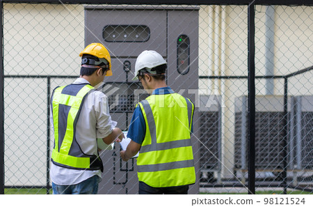 Electrical engineer working in control room. 98121524