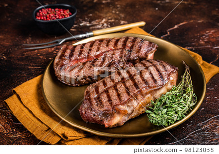 Grilled Shoulder Top Blade or Australia wagyu oyster blade beef steak. Dark background. Top View 98123038