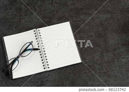 Notes and glasses Notes and glasses 98123742