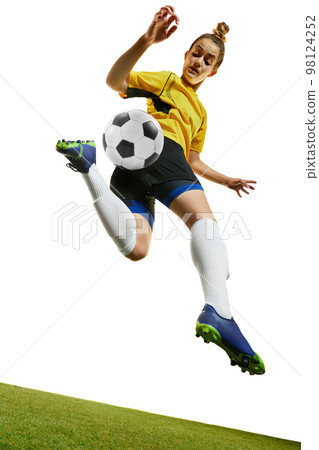Young woman, professional female football, soccer player in motion, training, playing isolated over white background. Dynamic game 98124252
