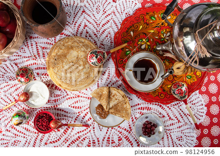 Russian pancake blini with berries and sour cream 98124956