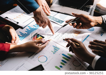 Business people meeting to discuss the situation on the market. Business Financial Concept Business people meeting to discuss the situation on the market. Business Financial Concept 98125251