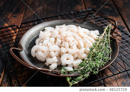 Boiled Peeled Shrimps, Prawns set. Wooden background. top view Boiled Peeled Shrimps, Prawns set. Wooden background. top view 98125729