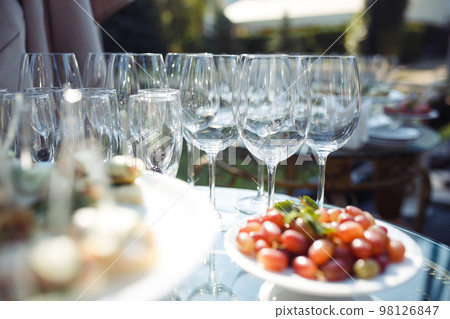 Champagne glasses on gold background. Party and holiday celebration concept 98126847