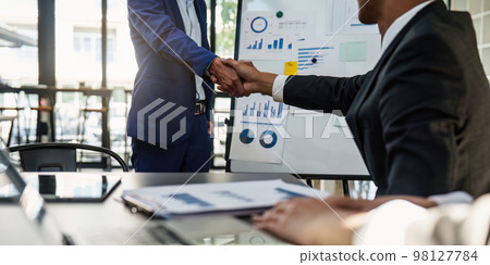 Business shaking hands. Successful businessmen handshaking after good deal. Finishing up meeting concept Business shaking hands. Successful businessmen handshaking after good deal. Finishing up meeting concept 98127784