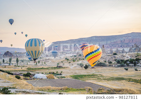 Colorful hot air balloon flying over Cappadocia, Turkey Colorful hot air balloon flying over Cappadocia, Turkey 98127811