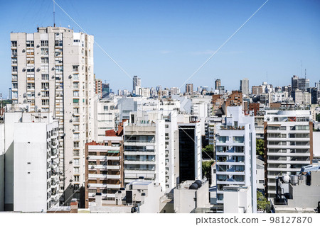 View of Buenos Aires from above. Cityscape architecture, houses and roofs of areas of Buenos Aires, Argentina. View of Buenos Aires from above. Cityscape architecture, houses and roofs of areas of Buenos Aires, Argentina. 98127870