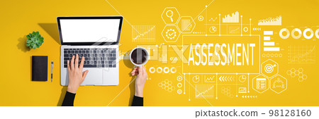 Assessment concept with person using laptop computer Assessment concept with person using laptop computer 98128160