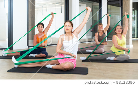 People with working out with rubber bands People with working out with rubber bands 98128390