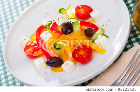 Greek vegetable salad with cheese and olive oil Greek vegetable salad with cheese and olive oil 98128525