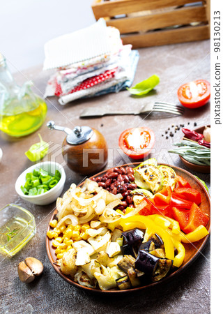fried mix vegetables on plate 98130213