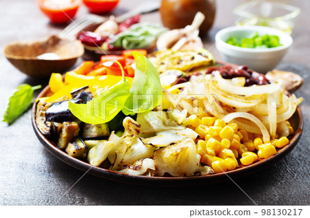 fried mix vegetables on plate 98130217